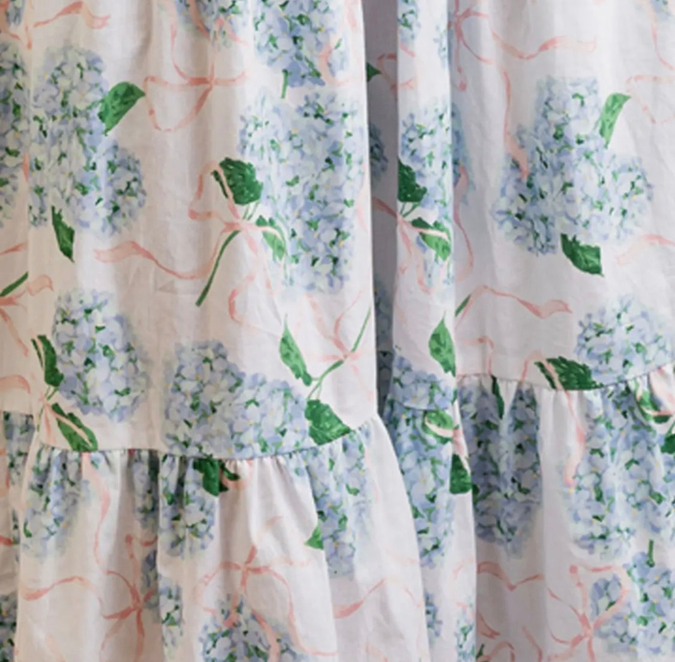 Hydrangea Ribbons Smocked Flutter
Sleeve Dress